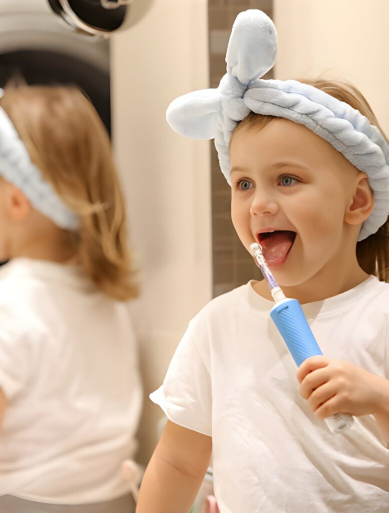 Child with toothbrush
