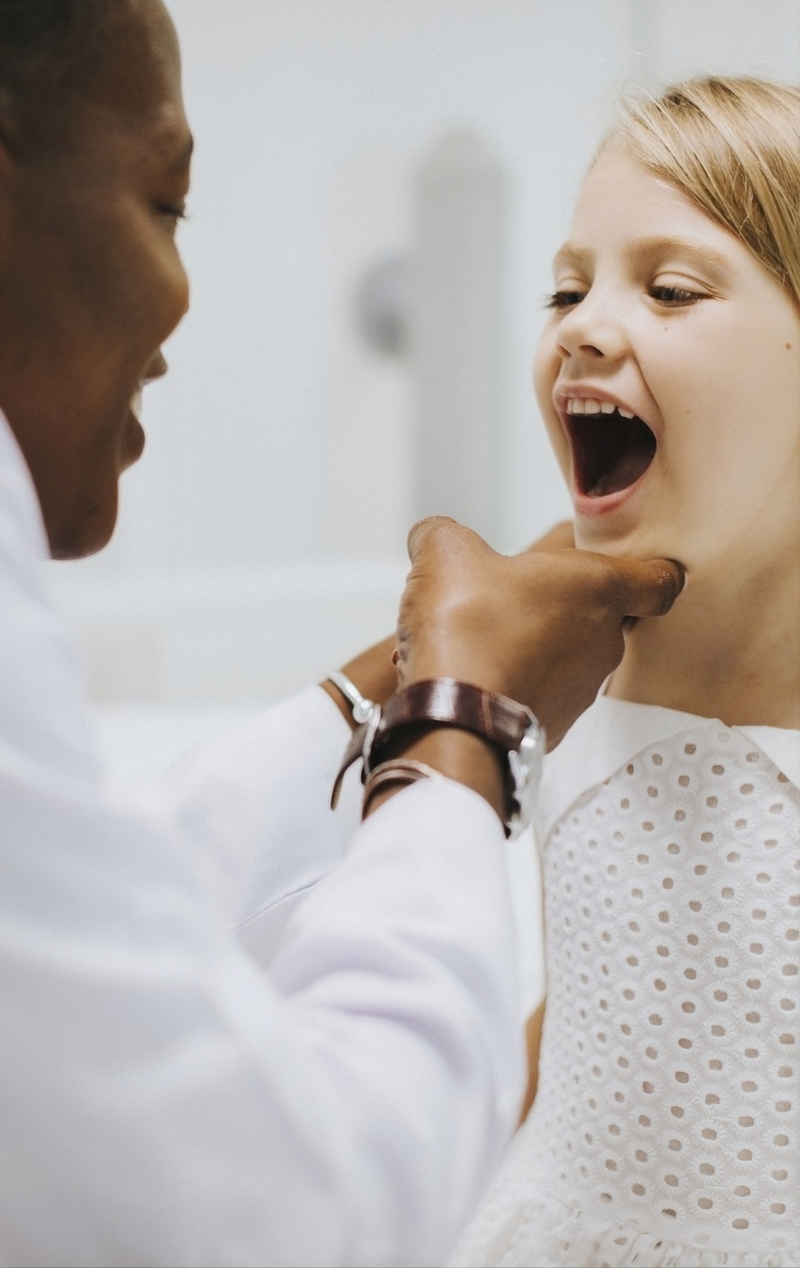 Dentist treats a child